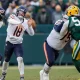 Caleb Williams takes shot at Green Bay Packers while signing trading cards